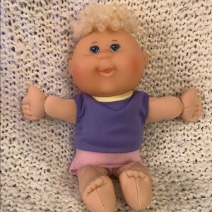 Cabbage Patch Kids doll, blonde, 11 inches tall.